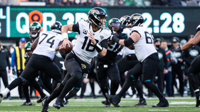 Jacksonville Jaguars QB Trevor Lawrence scrambles out of the pocket against the New York Jets at MetLife Stadium in East Rutherford, New Jersey.