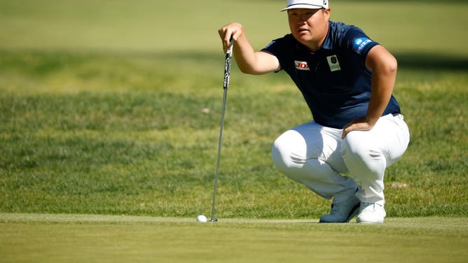 Sungjae Im of Korea lines up a putt on the 4th green during the 3rd round of The Genesis Invitational at Riviera Country Club in Pacific Palisades, California.