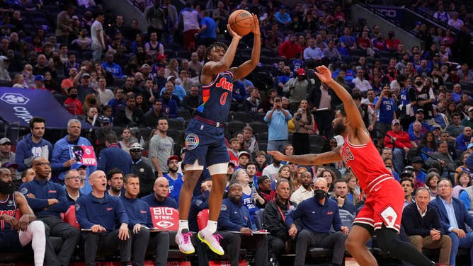 Sixers combo guard Tyrese Maxey shoots the ball over Chicago Bulls SG Coby White at the Wells Fargo Center in Philadelphia.