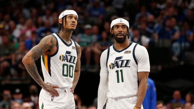 Utah Jazz guards Jordan Clarkson and Mike Conley talk during a timeout in the 2nd half against the Dallas Mavericks at American Airlines Center in Dallas.