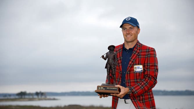 Jordan Spieth poses with the trophy after winning the RBC Heritage in a playoff at Harbor Town Golf Links in Hilton Head Island, South Carolina.