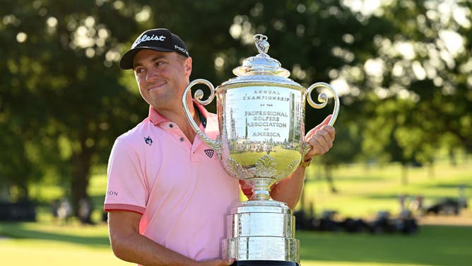 Justin Thomas celebrates with the Wanamaker Trophy after the final round of the PGA Championship at Southern Hills Country Club in Tulsa, Oklahoma.