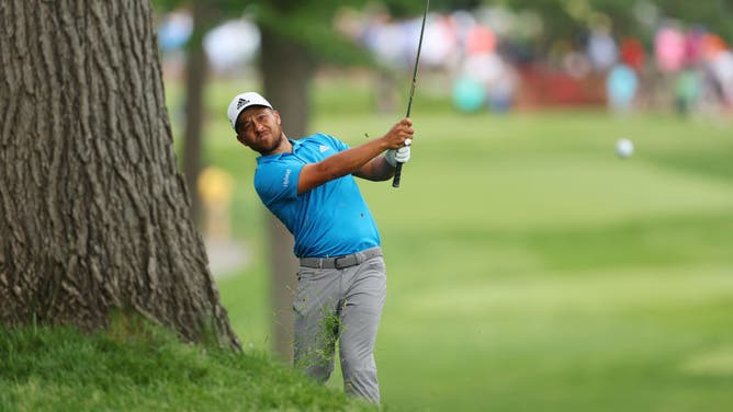 Xander Schauffele plays a shot on the 15th hole during the 1st round of the Memorial Tournament at Muirfield Village Golf Club in Dublin, Ohio.