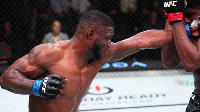 From left to right, Karl Roberson punches Kennedy Nzechukwu of Nigeria in their light heavyweight fight during the UFC Fight Night event at UFC APEX on July 9, 2022 in Las Vegas.