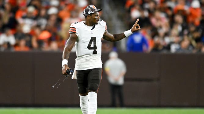 Cleveland Browns QB Deshaun Watson signals to teammates during the 1st half of a preseason game against the Chicago Bears at FirstEnergy Stadium in Cleveland, Ohio.