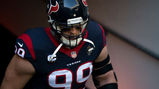 J.J. Watt of the Houston Texans runs out of the tunnel prior to an NFL game against the Tennessee Titans.
