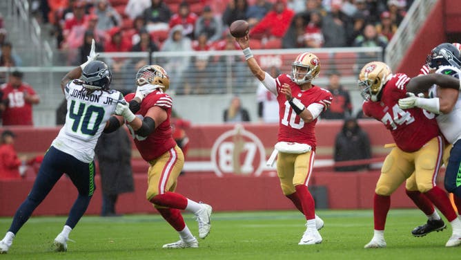 San Francisco 49ers QB Jimmy Garoppolo passes during the game against the Seattle Seahawks at Levi's Stadium in Santa Clara, California.