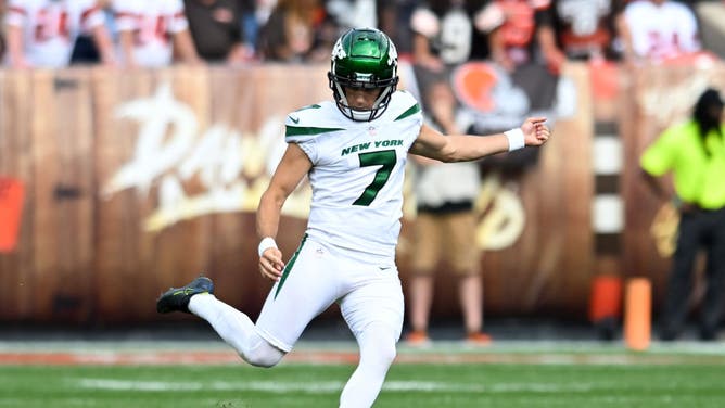 Braden Mann of the New York Jets attempts an onside kick against the Cleveland Browns during the 2022 NFL season.
