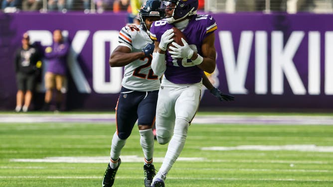 Minnesota Vikings WR Justin Jefferson catches a pass ahead of Chicago Bears CB Kindle Vildor at U.S. Bank Stadium in Minneapolis.