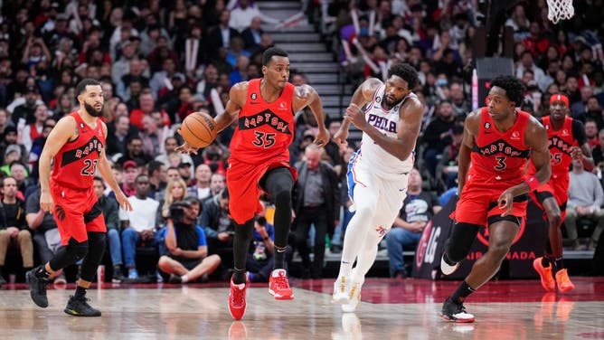 The Toronto Raptors getting out in transition with Philadelphia 76ers big Joel Embiid in pursuit at the Scotiabank Arena in Toronto, Canada.