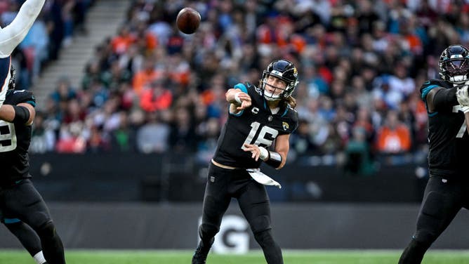 Jacksonville Jaguars QB Trevor Lawrence throws a pass over the middle vs. the Broncos at Wembley Stadium in London.