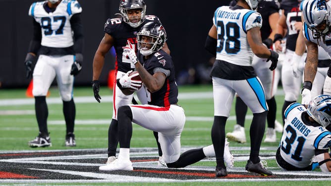 Falcons TE Kyle Pitts reacts after a 1st down vs. the Carolina Panthers at Mercedes-Benz Stadium in Atlanta.