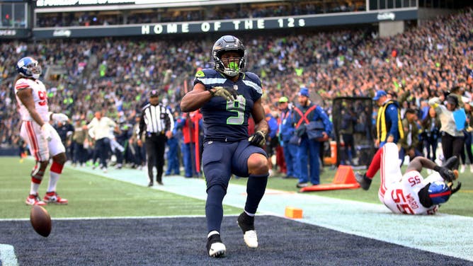 Seattle Seahawks RB Kenneth Walker celebrates a touchdown against the New York Giants during the fourth quarter at Lumen Field in Seattle, Washington.