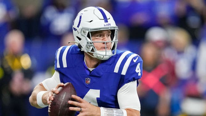 Colts QB Sam Ehlinger looks to pass in his first NFL game.