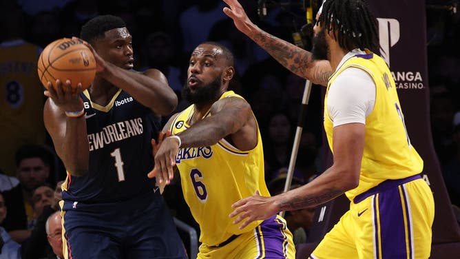 New Orleans Pelicans PF Zion Williamson is double-teamed by Lakers SF LeBron James and PF Anthony Davis at Crypto.com Arena in Los Angeles.