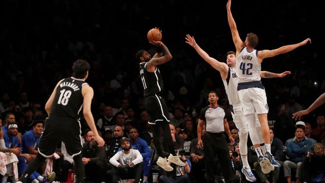 Brooklyn Nets PG Kyrie Irving shoots a fadeaway against the Dallas Mavericks at Barclays Center.