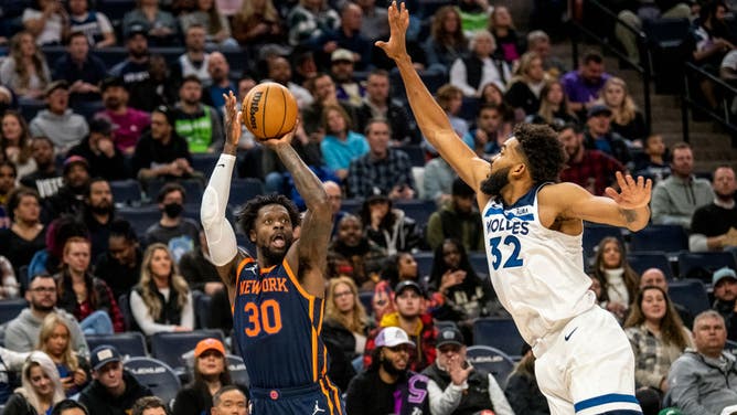 Timberwolves big Karl-Anthony Towns contests a New York Knicks wing Julius Randle 3-pointer at Target Center in Minneapolis.