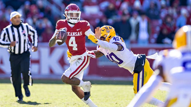 Arkansas quarterback Malik Hornsby is tackled by LSU linebacker Harold Perkins Jr. who dominated for head coach Brian Kelly on Saturday.