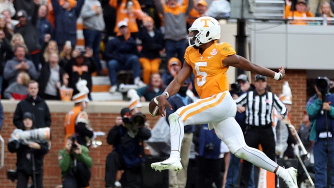 Tennessee Volunteers QB Hendon Hooker scores a TD against the Missouri Tigers at Neyland Stadium in Knoxville, Tennessee.