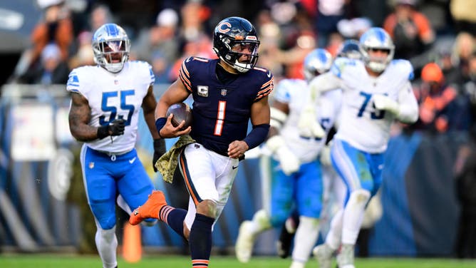 Chicago Bears QB Justin Fields runs for a TD during the 4th quarter against the Detroit Lions at Soldier Field in Chicago.