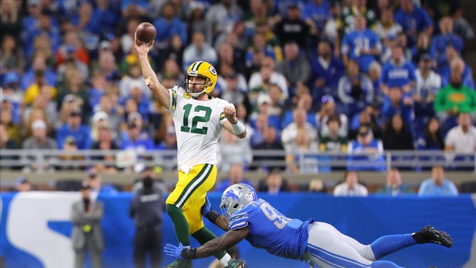 Green Bay Packers QB Aaron Rodgers throws a pass in the 4th quarter at Ford Field in Detroit.