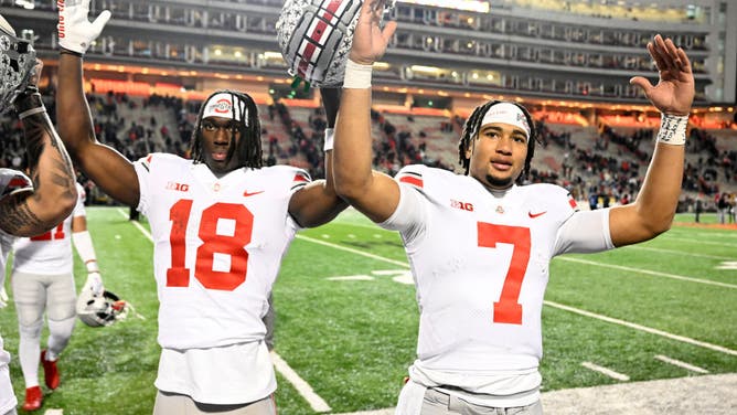 Ohio State Buckeyes WR Marvin Harrison Jr. and QB C.J. Stroud celebrate a victory against the Maryland Terrapins at SECU Stadium in College Park, Maryland.