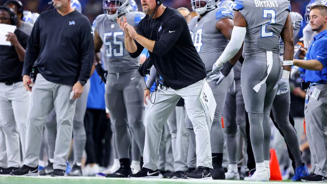 Detroit Lions head coach Dan Campbell cheers his team on during the 1st half against the Buffalo Bills at Ford Field in Detroit.