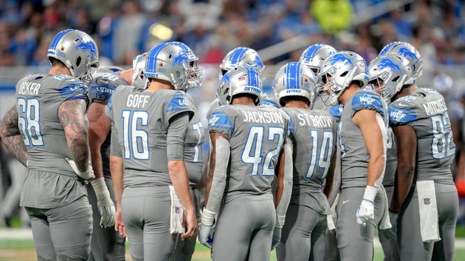 Detroit Lions QB Jared Goff talks with his team in a huddle against the Buffalo Bills at Ford Field in Detroit.