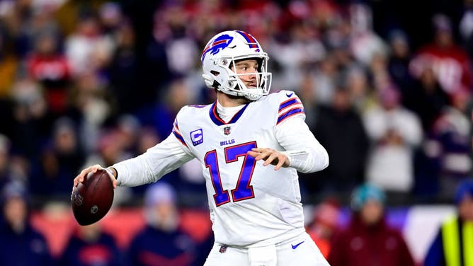 Buffalo Bills QB Josh Allen drops back to pass in the 1st quarter against the New England Patriots at Gillette Stadium in Foxborough, Massachusetts.
