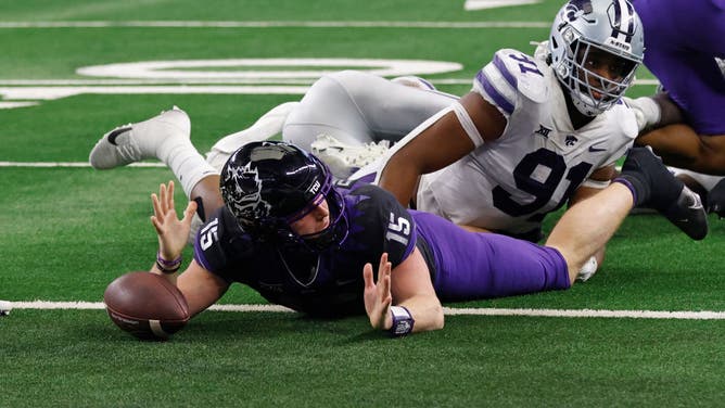 TCU Horned Frogs QB Max Duggan reacts after being called down just short of the goal line in OT against the Kansas State Wildcats in the Big XII Championship at AT&T Stadium in Arlington, Texas.