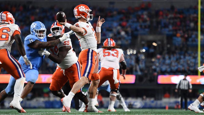 Clemson Tigers QB Cade Klubnik throws a pass against the North Carolina Tar Heels during the ACC Championship game at Bank of America Stadium in Charlotte, North Carolina.