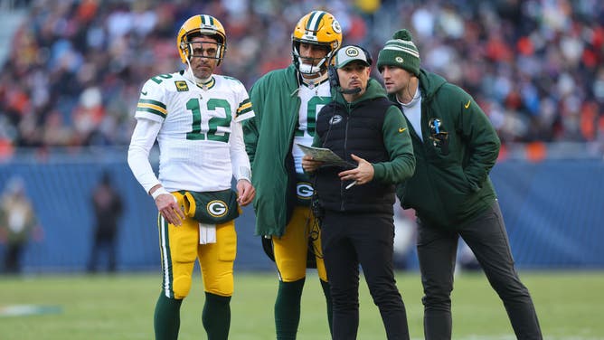 Green Bay Packers QB Aaron Rodgers talks with head coach Matt LaFleur against the Chicago Bears at Soldier Field in Chicago.