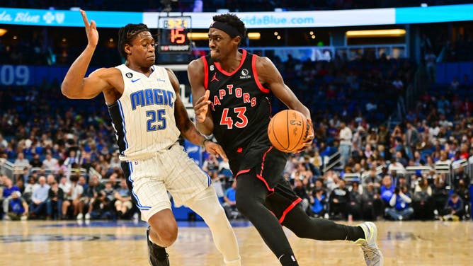 Toronto Raptors PF Pascal Siakam drives to the basket against Orlando Magic PF Admiral Schofield in the 1st half of a game at Amway Center in Orlando, Florida.