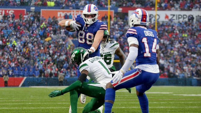 Bills tight end Dawson Knox scored on this play despite being hit well outside the endzone by Jets DB Sauce Gardner.