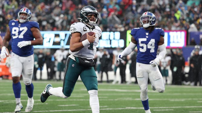 Philadelphia Eagles QB Jalen Hurts runs the ball for a TD during the 3rd quarter against the New York Giants at MetLife Stadium in East Rutherford, New Jersey.