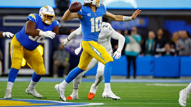 Los Angeles Chargers QB Justin Herbert passes during a game against the Miami Dolphins at SoFi Stadium in Inglewood, California.
