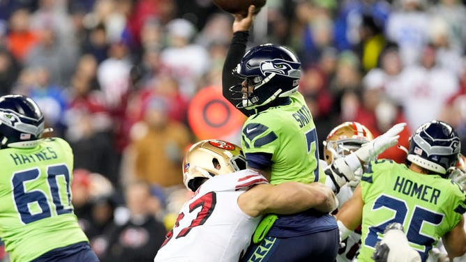 49ers defender Nick Bosa with a perfect form tackle on Seahawks QB Geno Smith comes with a roughing the passer penalty on Thursday Night Football.
