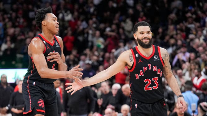 Toronto Raptors SF Scottie Barnes and PG Fred VanVleet high-fives against the Brooklyn Nets at the Scotiabank Arena in Toronto, Ontario, Canada.