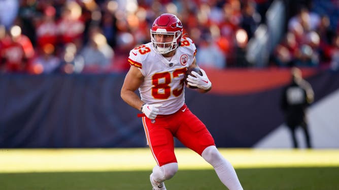 Chiefs TE Noah Gray runs with the football after catching a pass against the Denver Broncos at Empower Field at Mile High in Denver, Colorado.