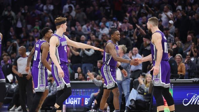 The Kings celebrate after scoring a bucket against the Charlotte Hornets at Golden 1 Center in Sacramento, California.