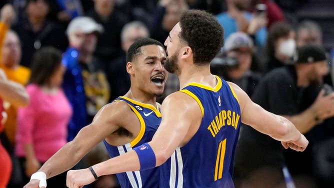 Golden State Warriors guards Jordan Poole and Klay Thompson celebrate after they defeated the the Portland Trail Blazers at Chase Center in San Francisco.