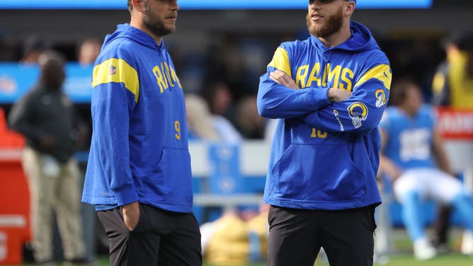 Rams QB Matthew Stafford and WR Cooper Kupp speak on the field prior to the game against the LA Chargers at SoFi Stadium in Inglewood, California.