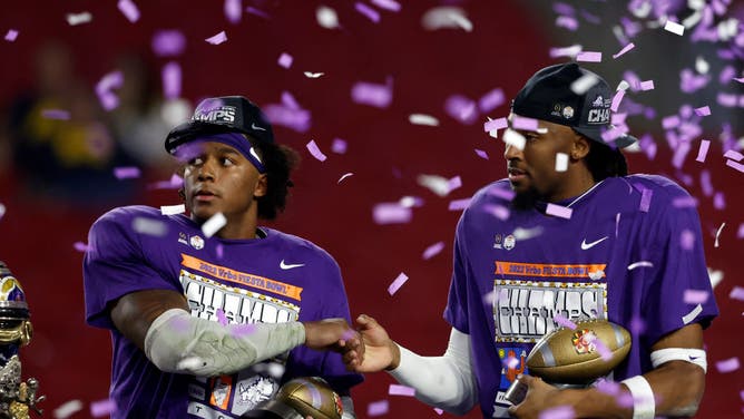 Linebacker Dee Winters and wide receiver Quentin Johnston of the TCU Horned Frogs celebrate after defeating the Michigan Wolverines 51-45 during the Vrbo Fiesta Bowl.