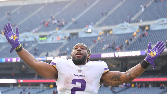 Alexander Mattison of the Minnesota Vikings celebrates after a game against the Chicago Bears.