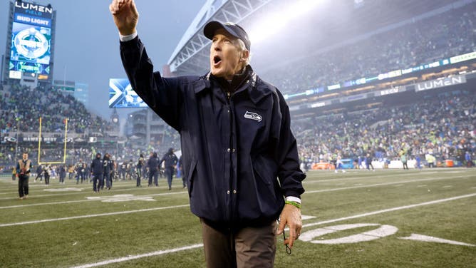 Seattle Seahawks coach Pete Carroll celebrates after defeating the Rams in overtime at Lumen Field in Seattle, Washington.
