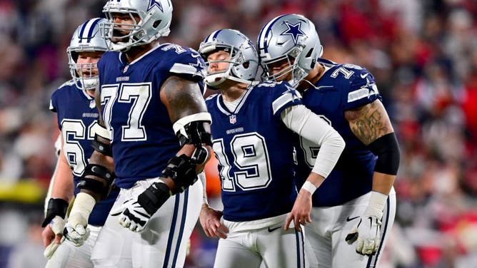 Brett Maher of the Dallas Cowboys reacts after missing an extra point against the Tampa Bay Buccaneers.