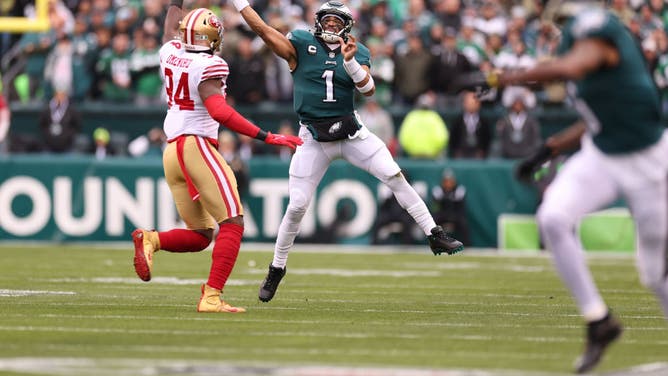 Jalen Hurts of the Philadelphia Eagles throws a pass to DeVonta Smith against the San Francisco 49ers in the NFC Championship Game in the NFL playoffs.