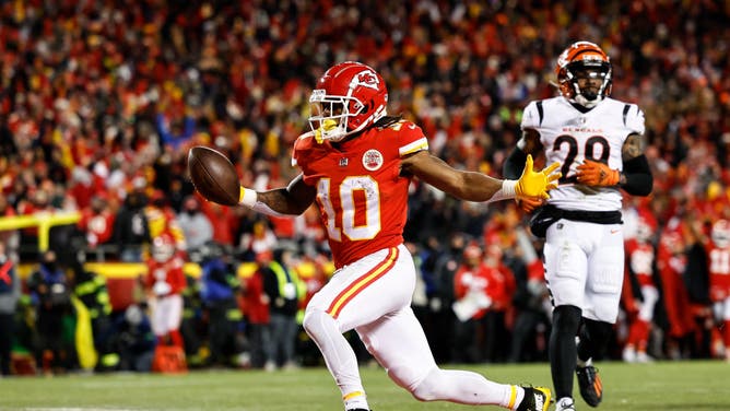 Chiefs RB Isiah Pachecocelebrates as he runs with the ball for a TD during the AFC Championship vs. the Bengals at GEHA Field at Arrowhead Stadium in Kansas City, Missouri.