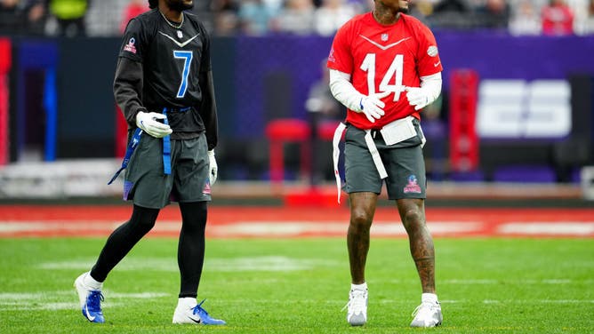 Trevon Diggs of the Dallas Cowboys and NFC and Stefon Diggs of the Buffalo Bills and AFC talk during the 2023 NFL Pro Bowl Games.