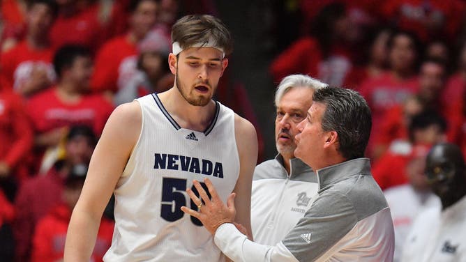 Nevada head coach Steve Alford to C Will Baker during their game vs. New Mexico in Albuquerque.